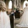 Bride with elegant updo showing cathedral veil integrated at nape with pearl earrings visible from behind