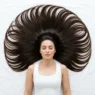 Woman's hair arranged in perfect circle around her head showing hairstyle inspiration potential