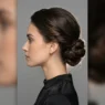 Woman with sophisticated low bun formal updo showing elegant side profile styling