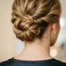 Close-up of elegant updo showing bobby pin placement and twisted hair sections